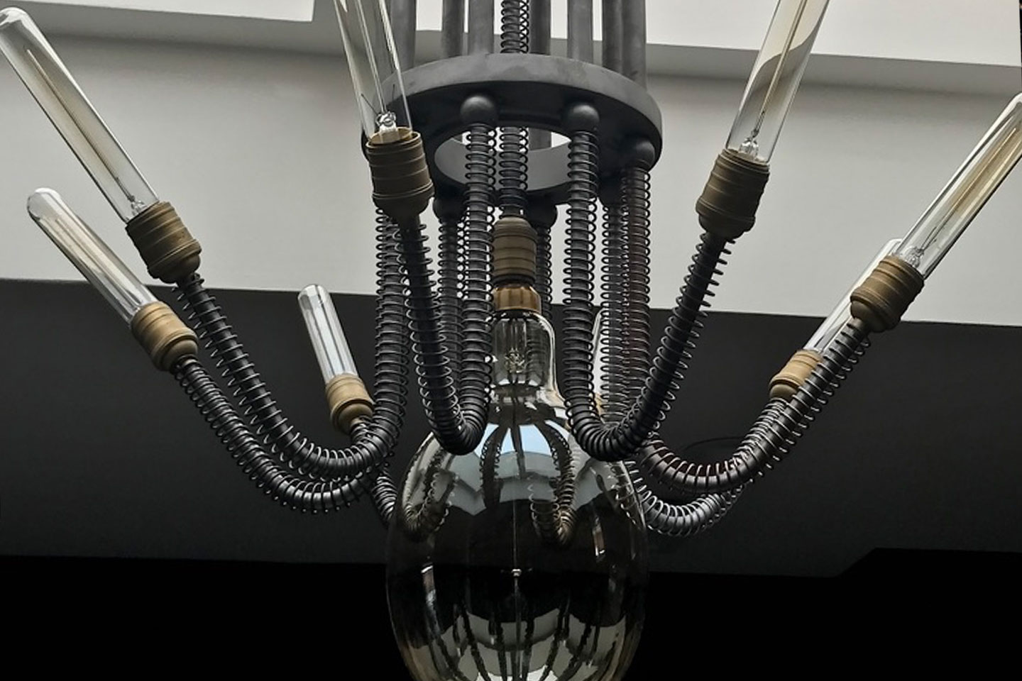 DCLA FAB completed custom lighting installation with engineered metal and glass components