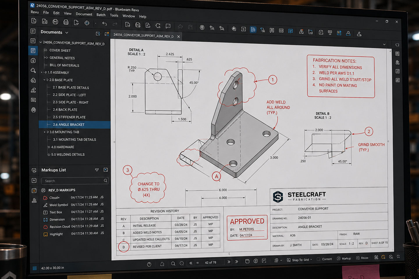 DCLA FAB revision-controlled engineering drawing displayed on industrial workstation with fabrication annotations and approval tracking.